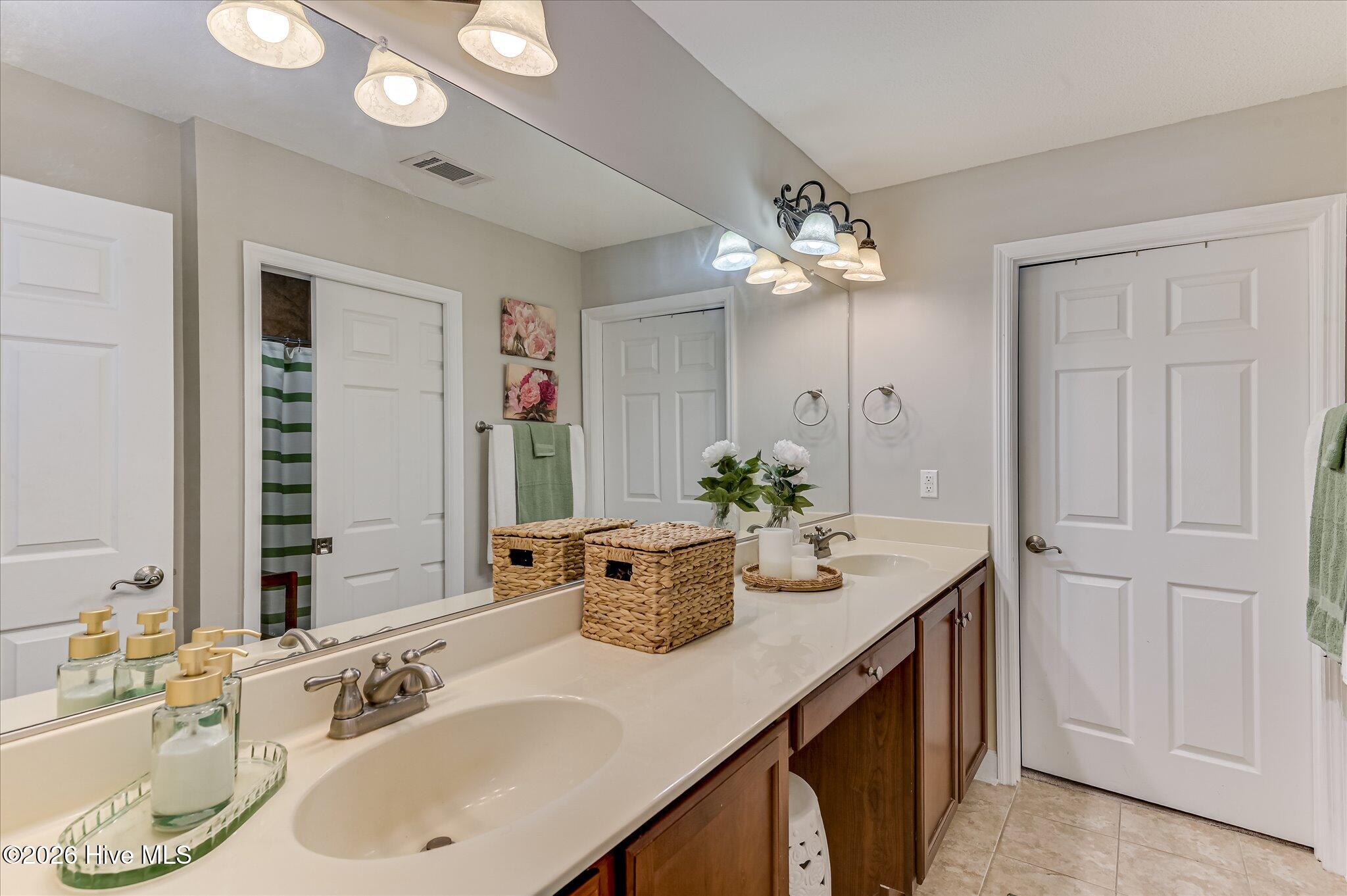 1211 Brookstone Way Augusta, GA 30909 - Photo 23 of 28 owners bathroom with duel sinks and sperate wet room