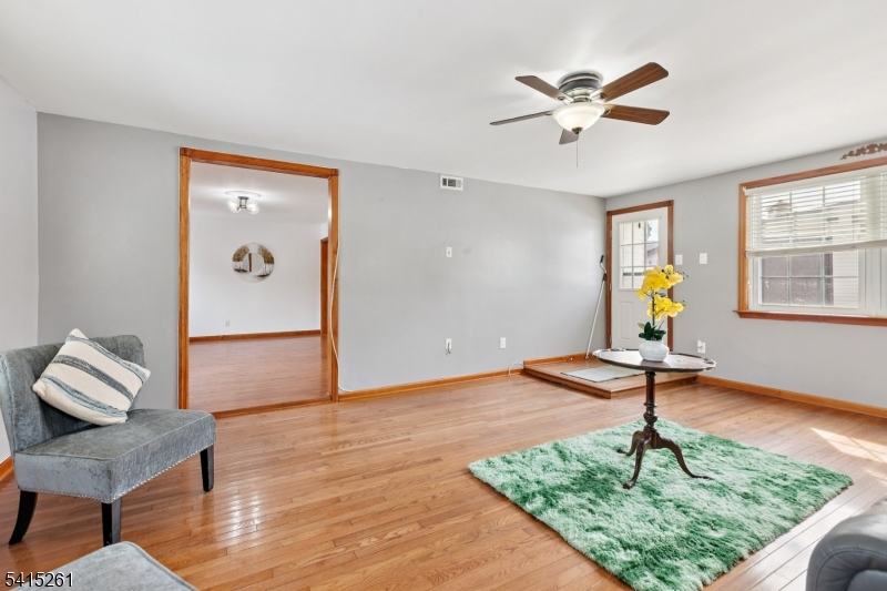 32 Glenville Road Edison, NJ 08817 - Photo 11 of 25 a living room with couch and a window