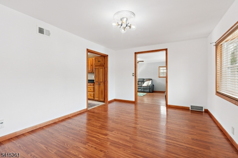 32 Glenville Road Edison, NJ 08817 - Photo 14 of 25 a view of empty room with wooden floor