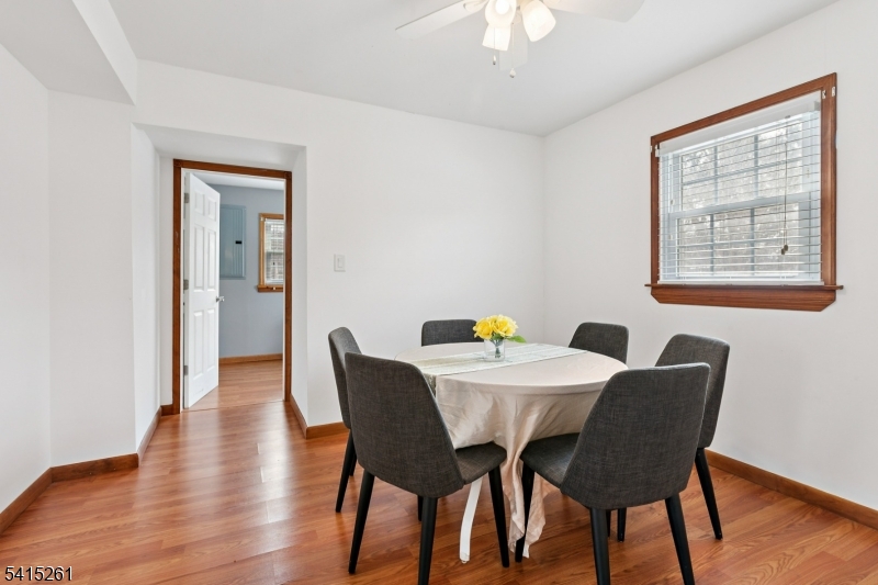 32 Glenville Road Edison, NJ 08817 - Photo 7 of 25 a view of a dining room with furniture and wooden floor