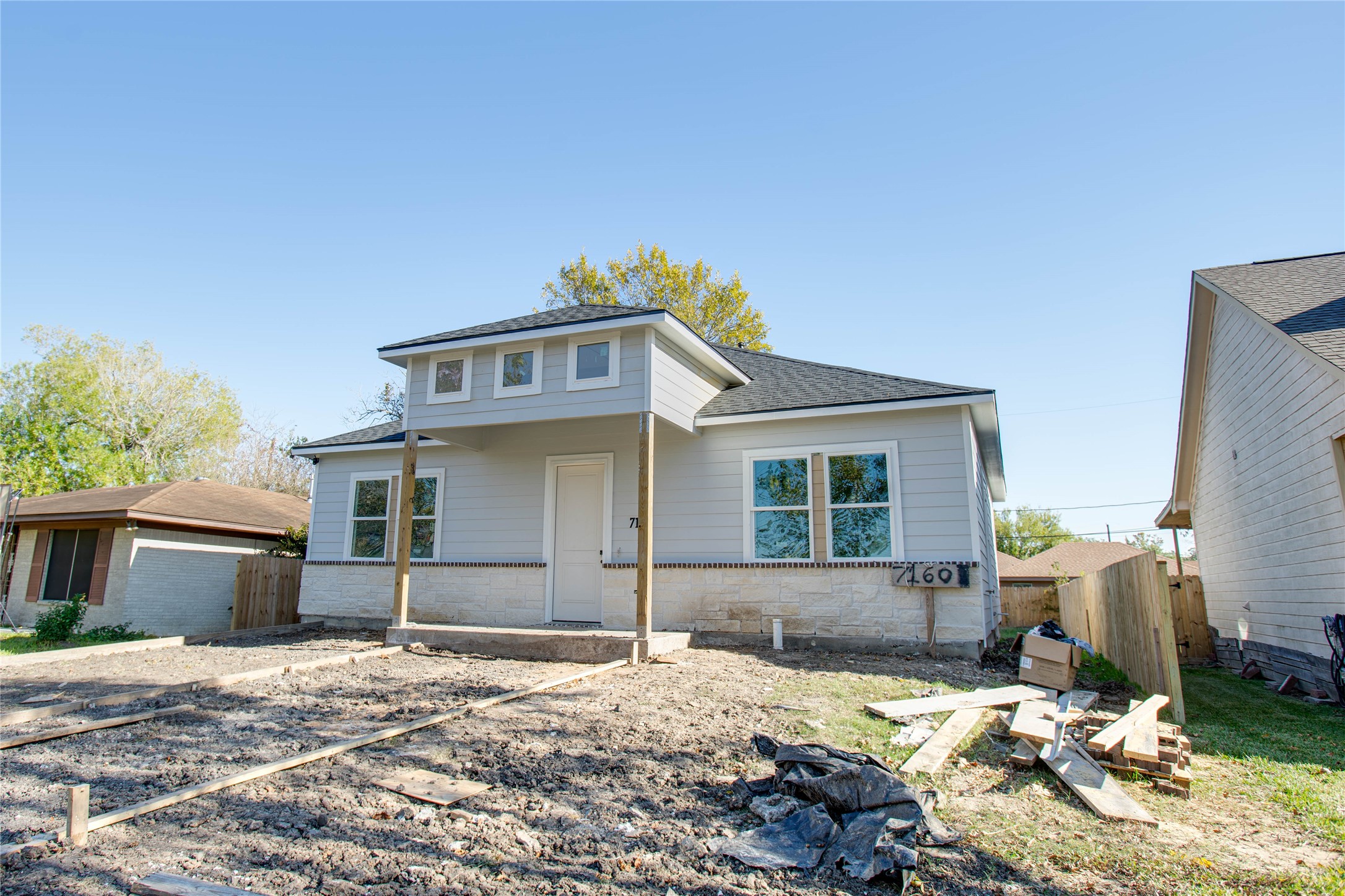 0 Rook Boulevard Houston, TX 77087 - Photo 3 of 15 a front view of a house with a yard