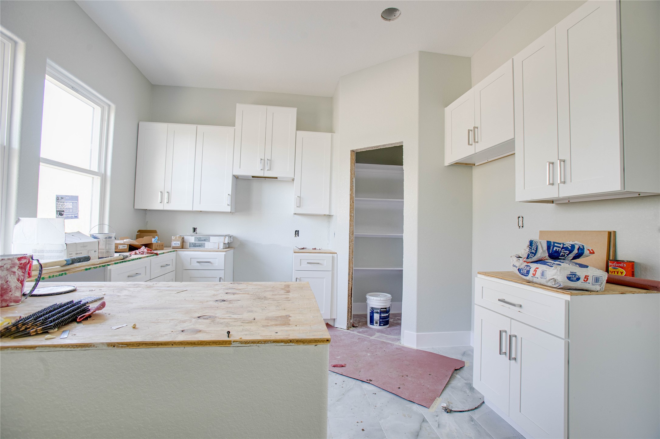 0 Rook Boulevard Houston, TX 77087 - Photo 6 of 15 a kitchen with stainless steel appliances granite countertop a sink stove and cabinets