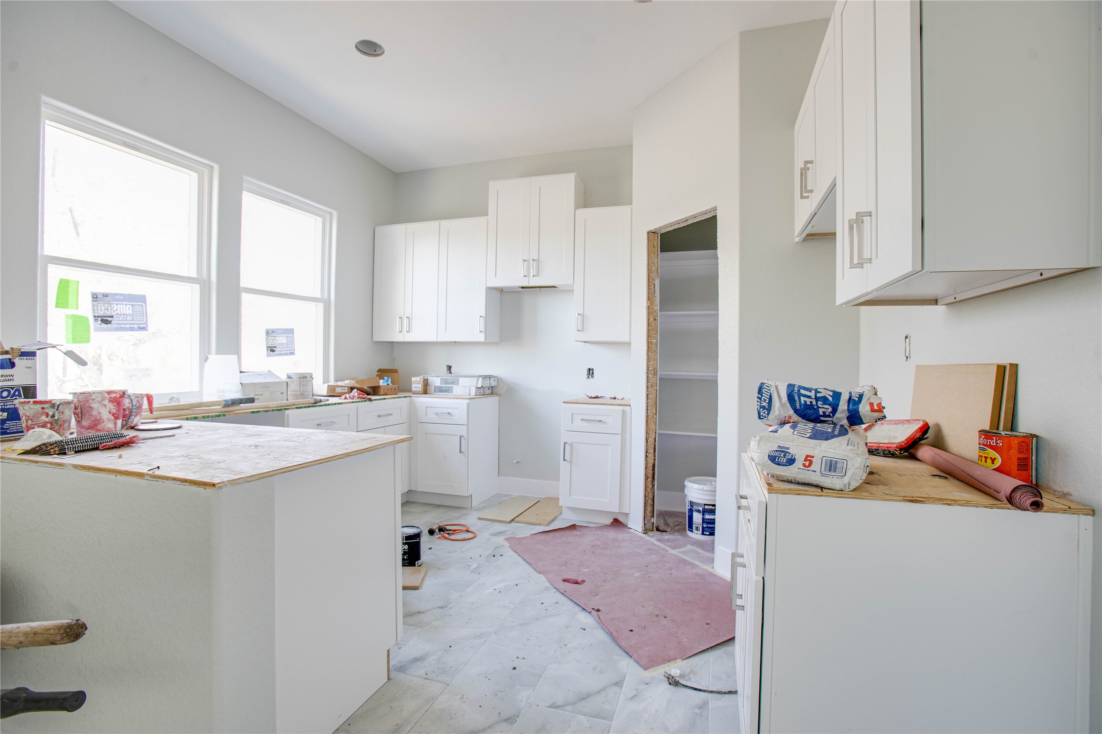 0 Rook Boulevard Houston, TX 77087 - Photo 7 of 15 a kitchen that has a lot of cabinets a sink and appliances in it