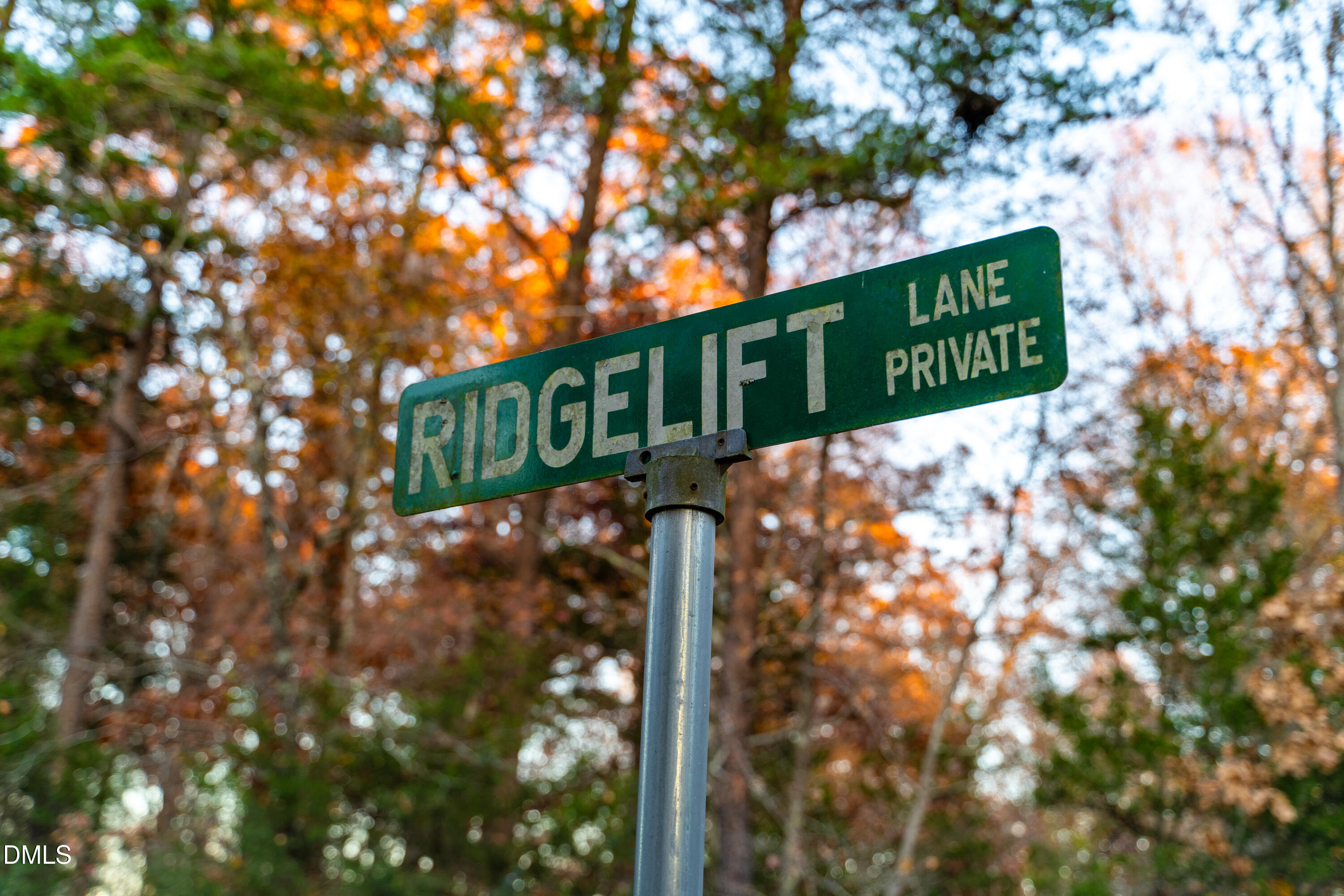 1122 Ridgelift Lane Hillsborough, NC 27278 - Photo 4 of 26 a street sign that is on a pole