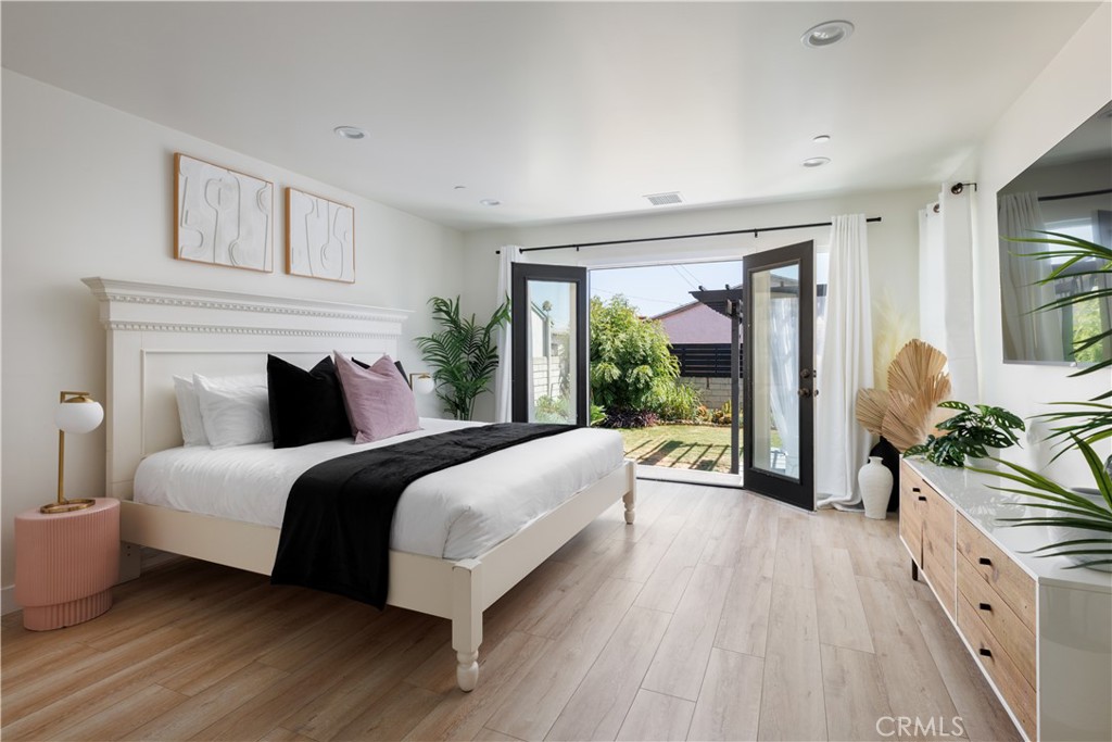 2820 Front Street Alhambra, CA 91803 - Photo 11 of 19 a spacious bedroom with a large bed and a large window