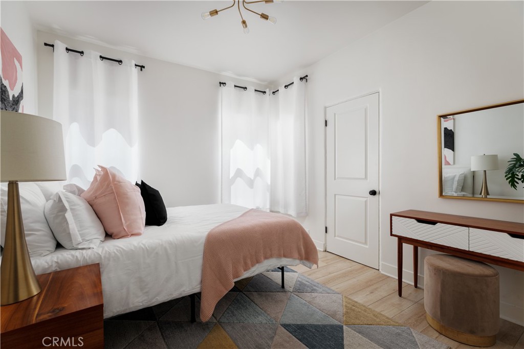 2820 Front Street Alhambra, CA 91803 - Photo 17 of 19 a bedroom with a bed and a painting on the wall