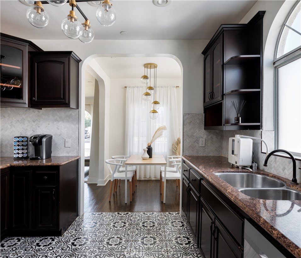 2820 Front Street Alhambra, CA 91803 - Photo 9 of 19 a kitchen with stainless steel appliances granite countertop a sink stove and refrigerator