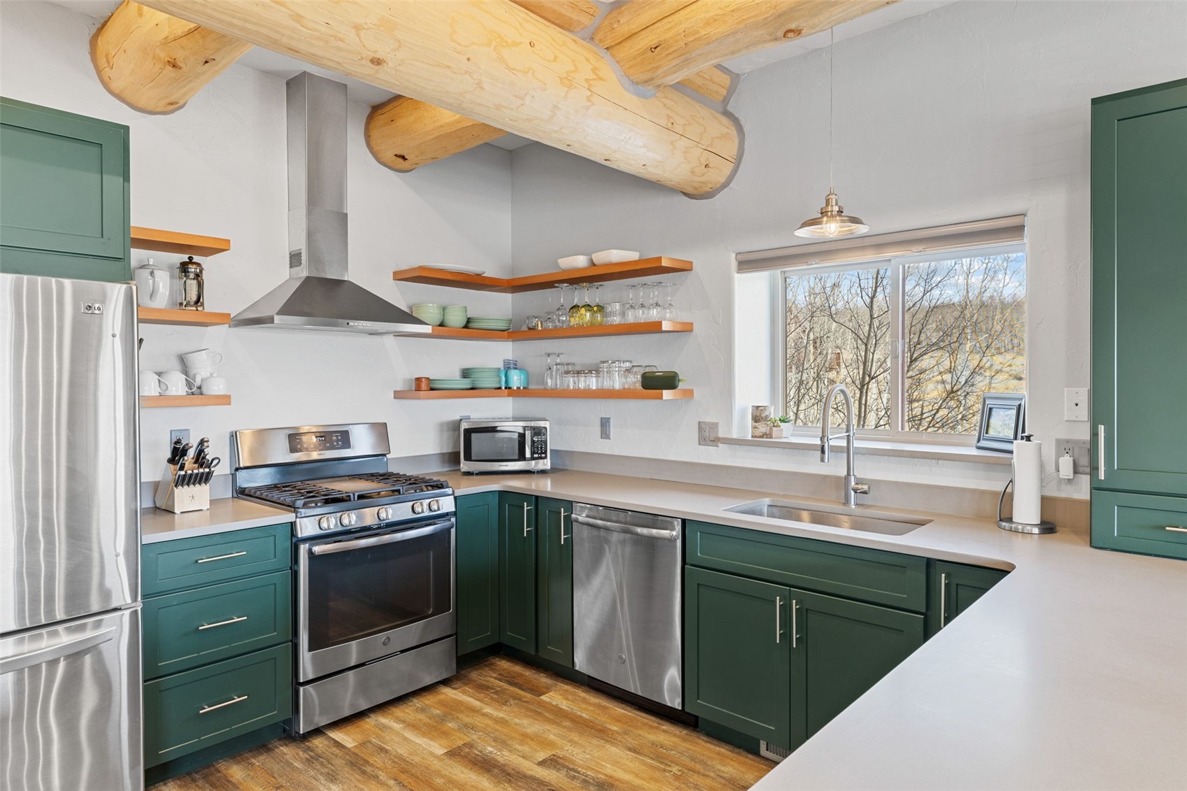 2542 High Creek Road Fairplay, CO 80440 - Photo 11 of 50 a kitchen with stainless steel appliances granite countertop a sink and a stove