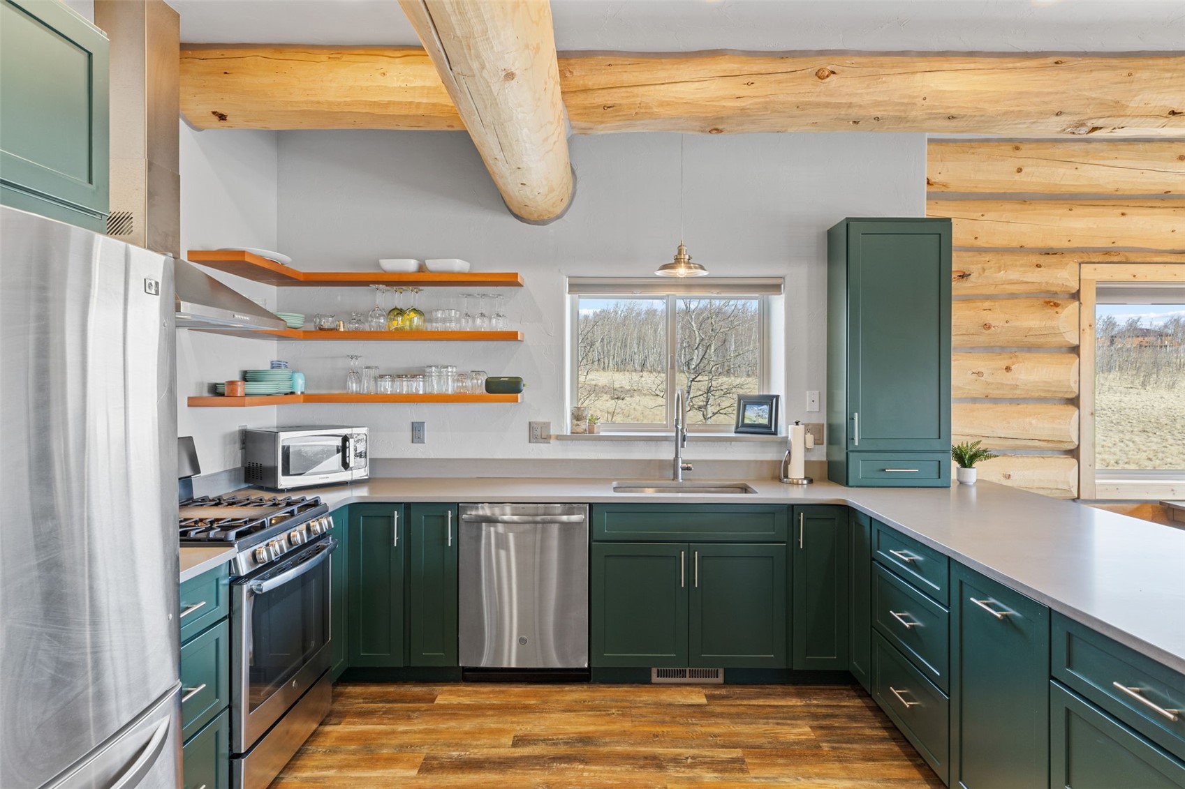 2542 High Creek Road Fairplay, CO 80440 - Photo 12 of 50 a kitchen with stainless steel appliances granite countertop a sink and a stove