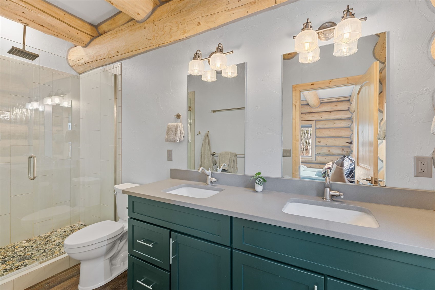 2542 High Creek Road Fairplay, CO 80440 - Photo 17 of 50 a bathroom with a sink double vanity granite toilet and a shower