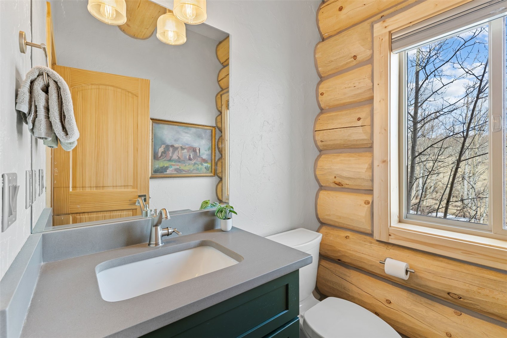 2542 High Creek Road Fairplay, CO 80440 - Photo 20 of 50 a bathroom with a granite countertop sink mirror vanity and toilet