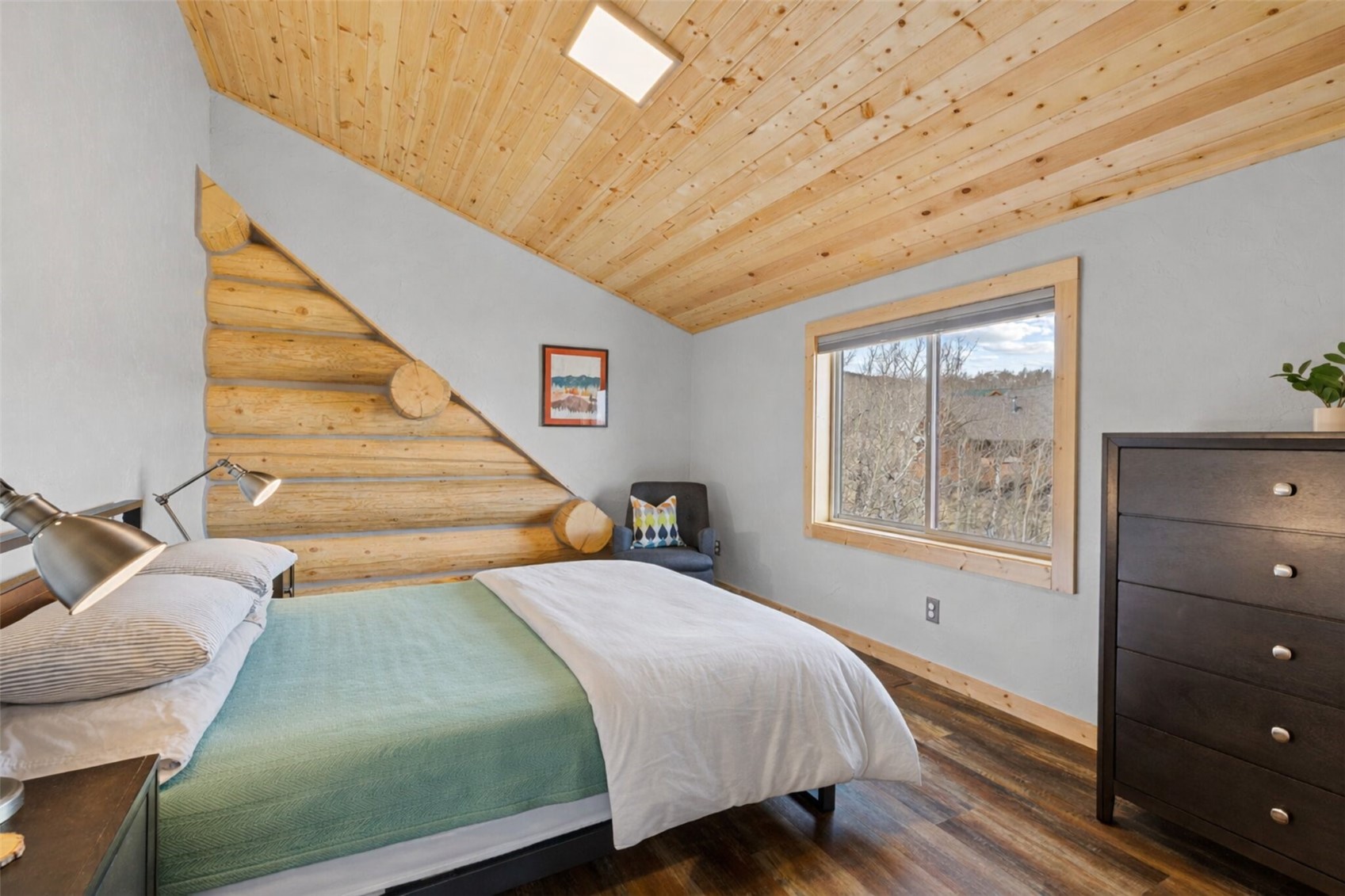 2542 High Creek Road Fairplay, CO 80440 - Photo 27 of 50 a bedroom with a bed and a window