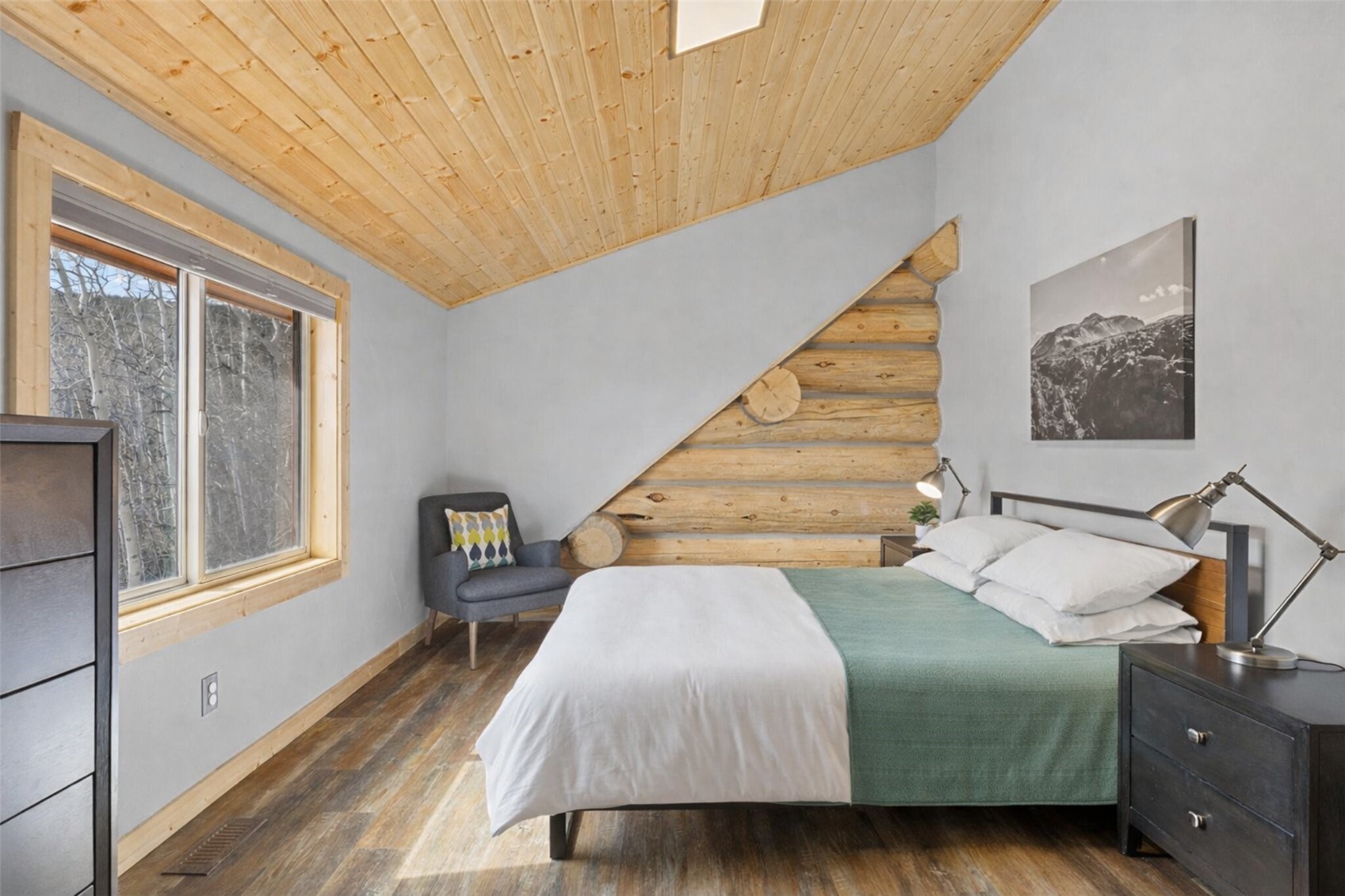 2542 High Creek Road Fairplay, CO 80440 - Photo 28 of 50 a bedroom with a bed and wooden floor