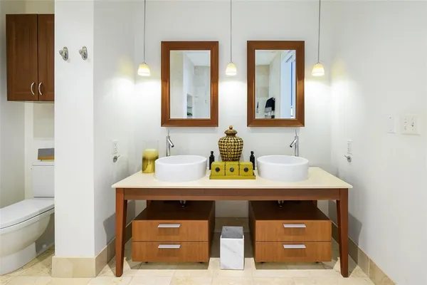 a bathroom with a sink and a toilet