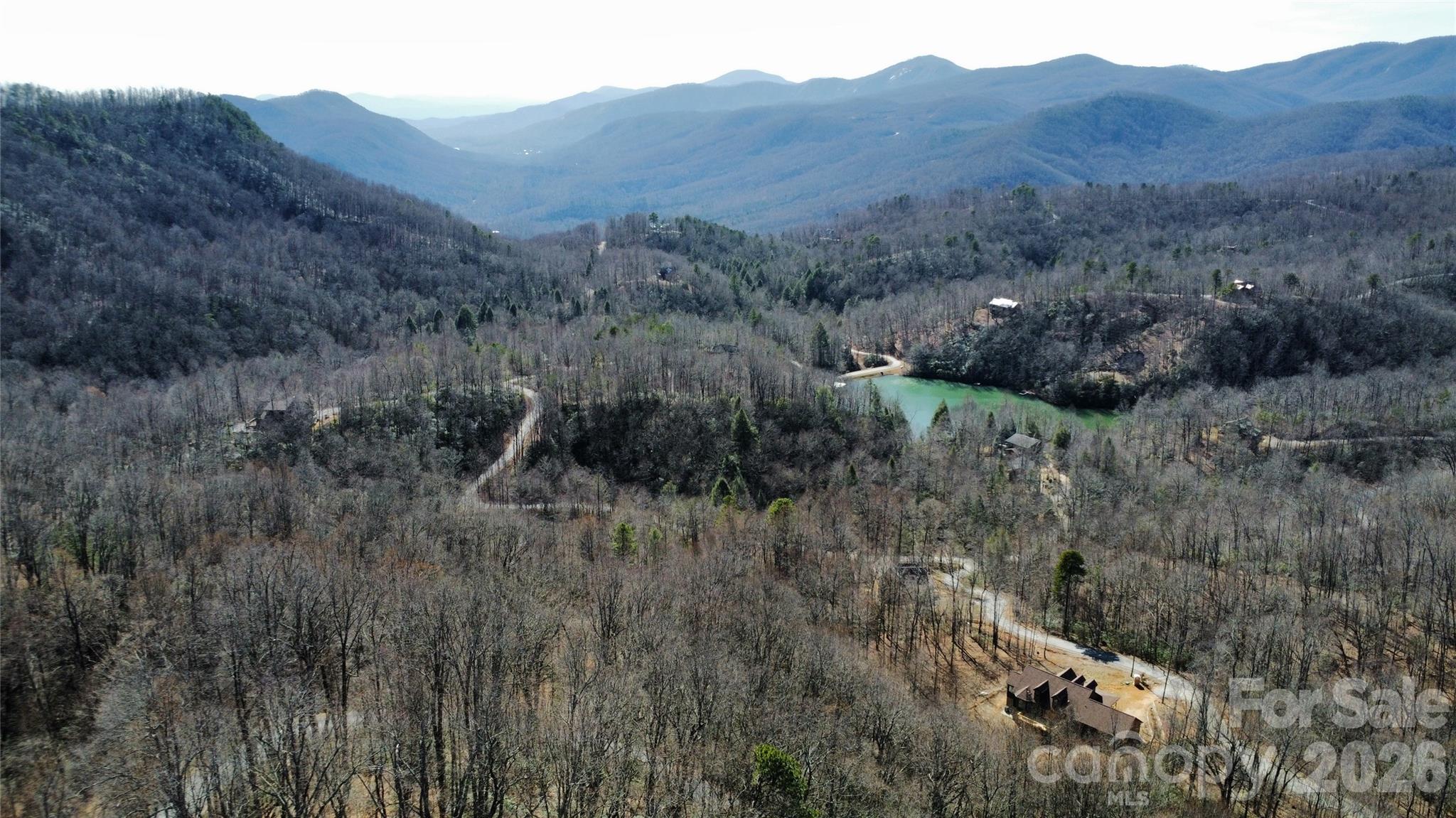 965 Wolf Pen Road Old Fort, NC 28762 - Photo 16 of 26 a view of a house with a mountain
