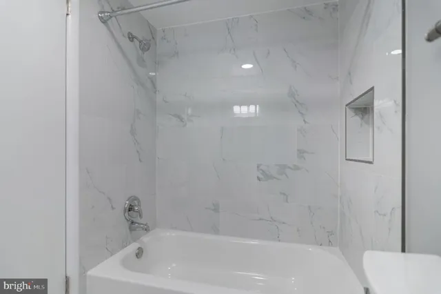 a bathroom with a bathtub