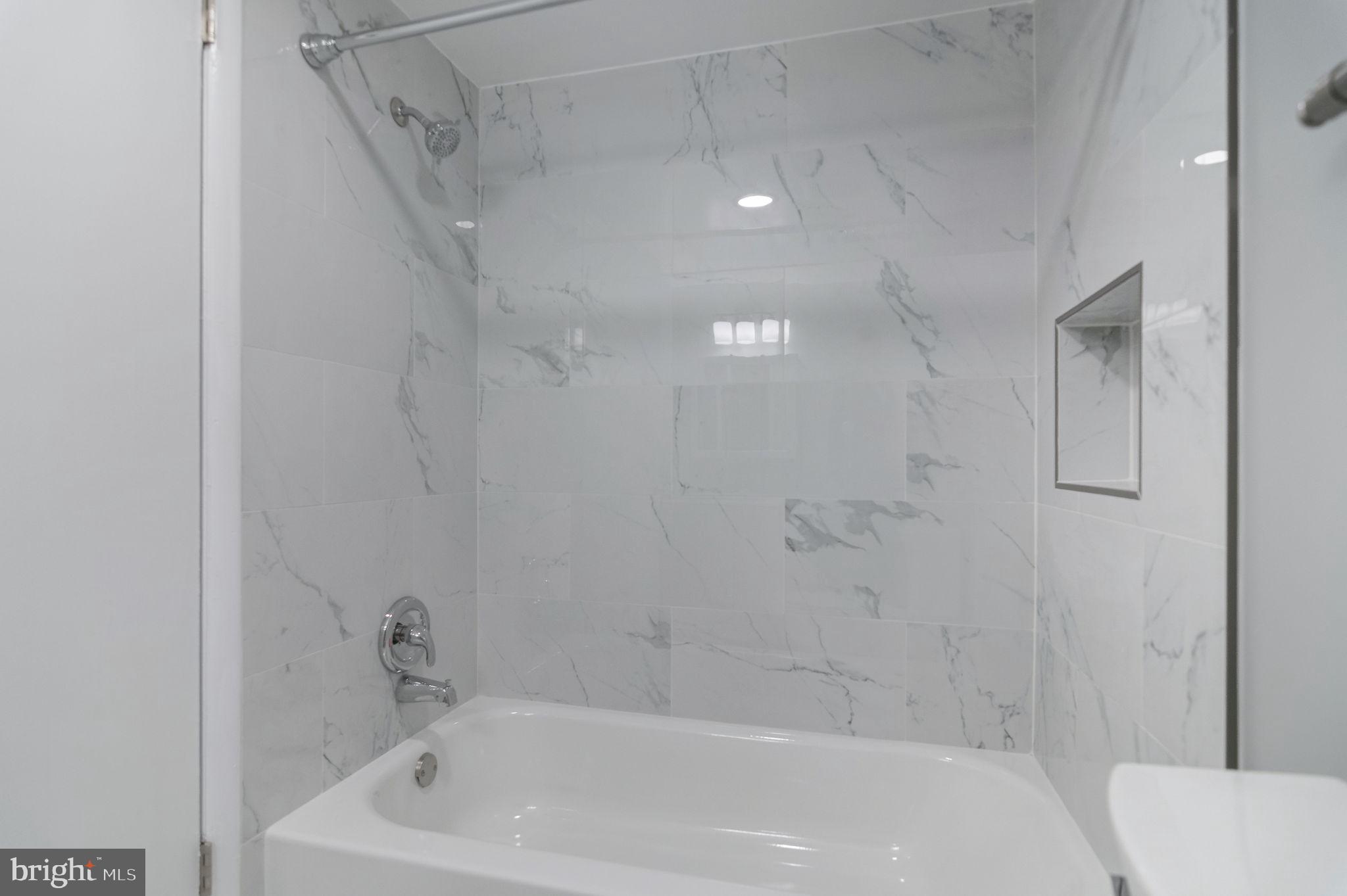 3356 Woodburn Road, Unit T3 Annandale, VA 22003 - Photo 20 of 35 a bathroom with a bathtub