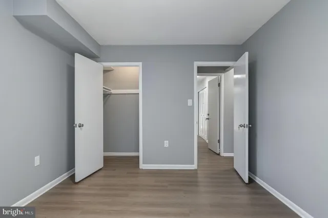 wooden floor and closet in a room