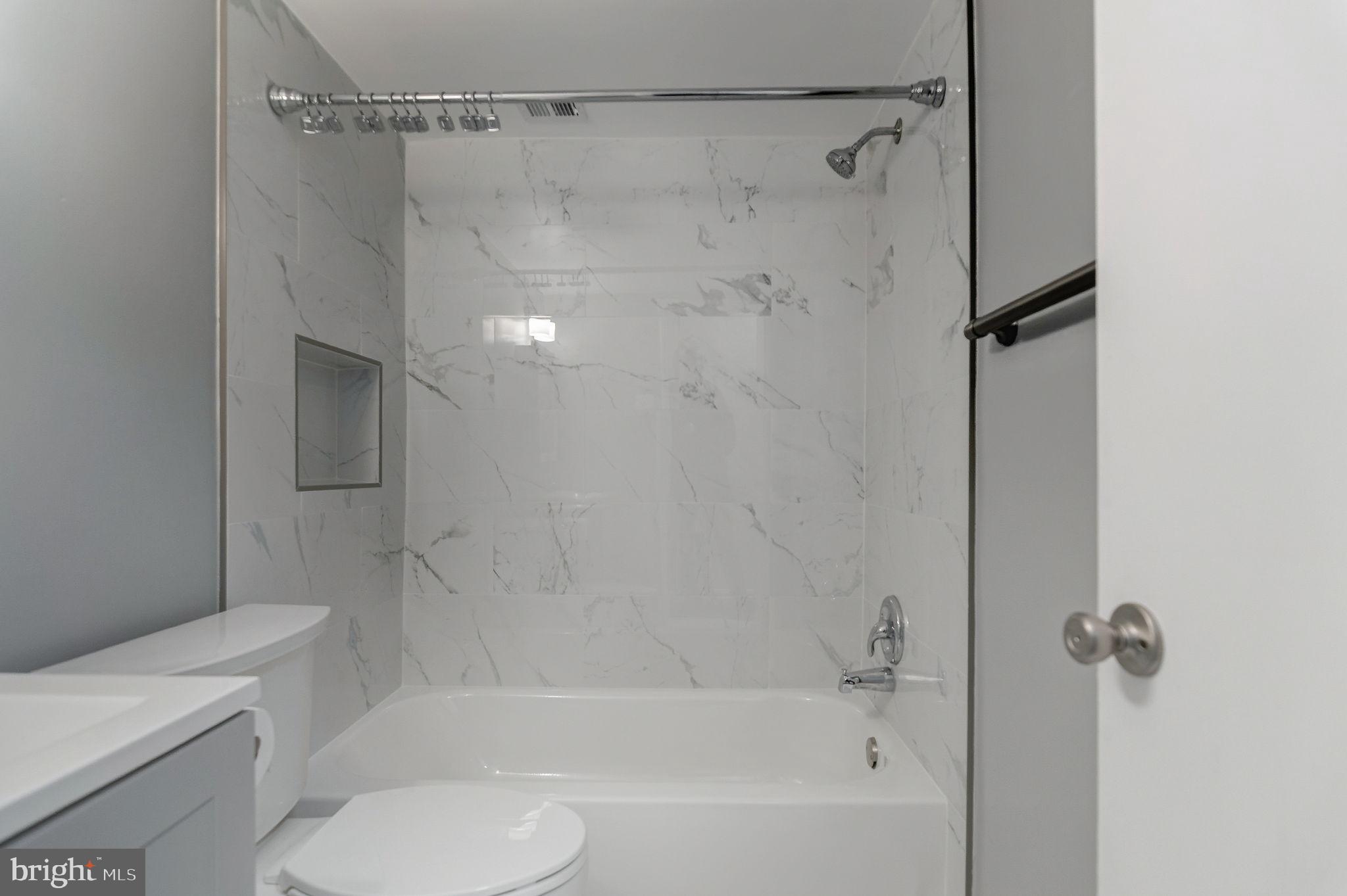 3356 Woodburn Road, Unit T3 Annandale, VA 22003 - Photo 27 of 35 a bathroom with a shower and a toilet