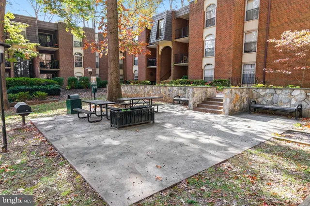 a view of a building with sitting area