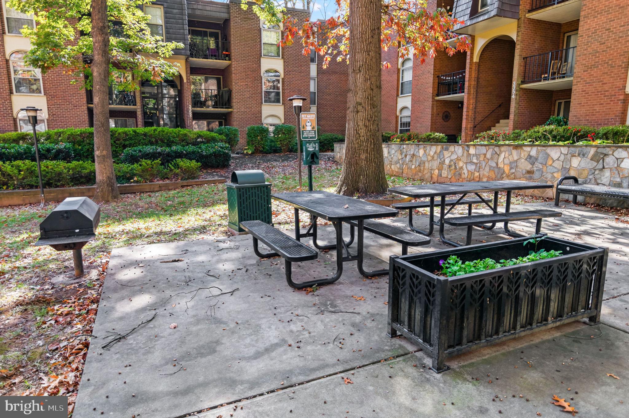 3356 Woodburn Road, Unit T3 Annandale, VA 22003 - Photo 35 of 35 a view of a chairs and table in the patio