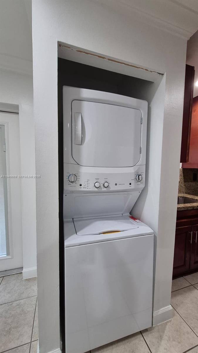 8531 Southwest 109th Avenue Miami, FL 33173 - Photo 10 of 19 a utility room with dryer and washer