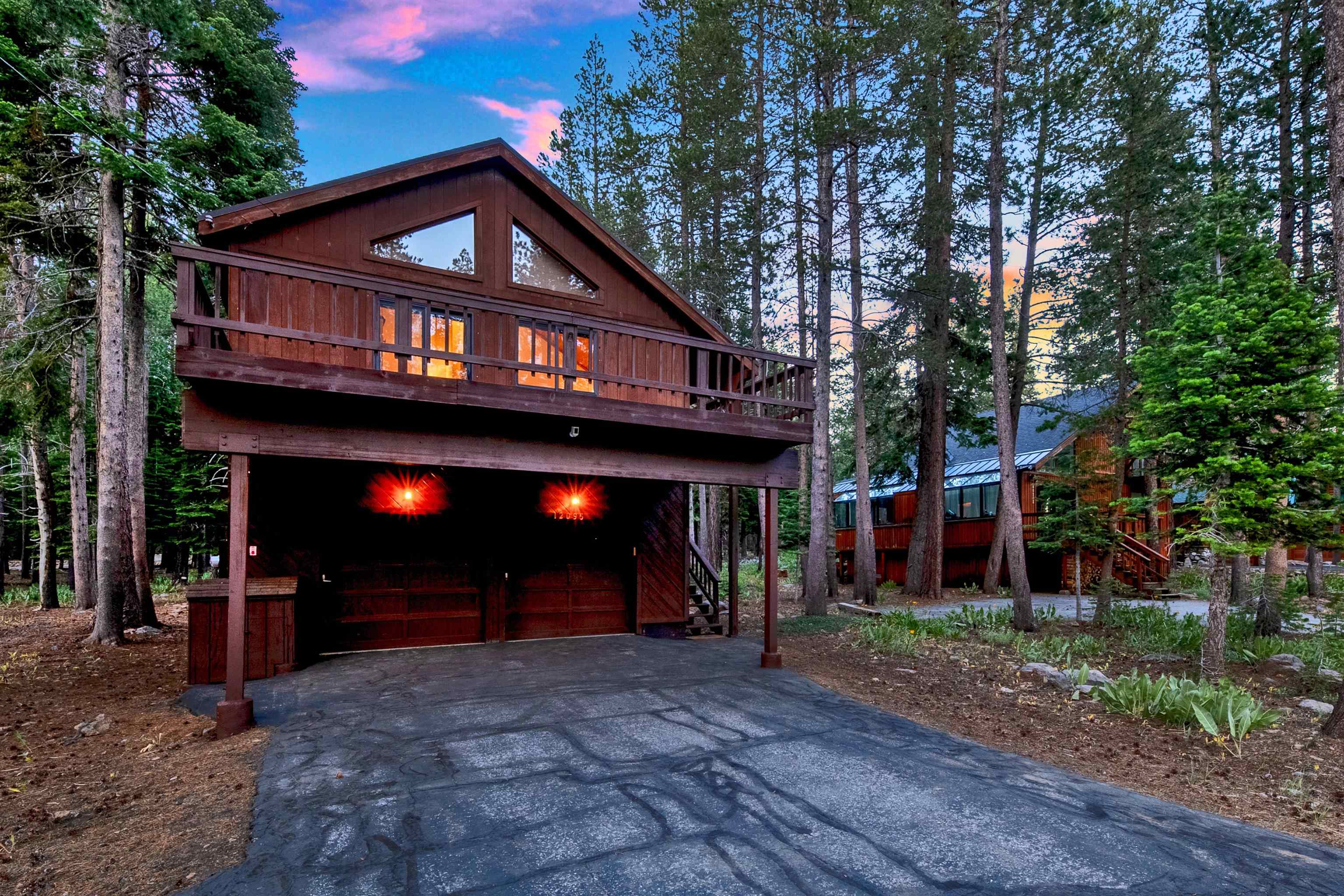 12095 Oslo Drive Truckee, CA 96161 - Photo 1 of 28 a view of a house with a yard and tree s