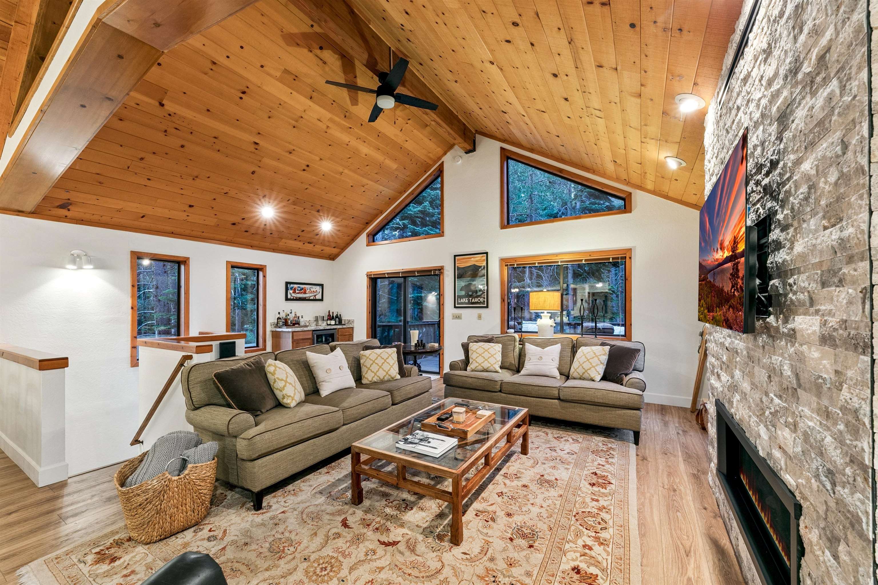 12095 Oslo Drive Truckee, CA 96161 - Photo 4 of 28 a living room with furniture and a fireplace