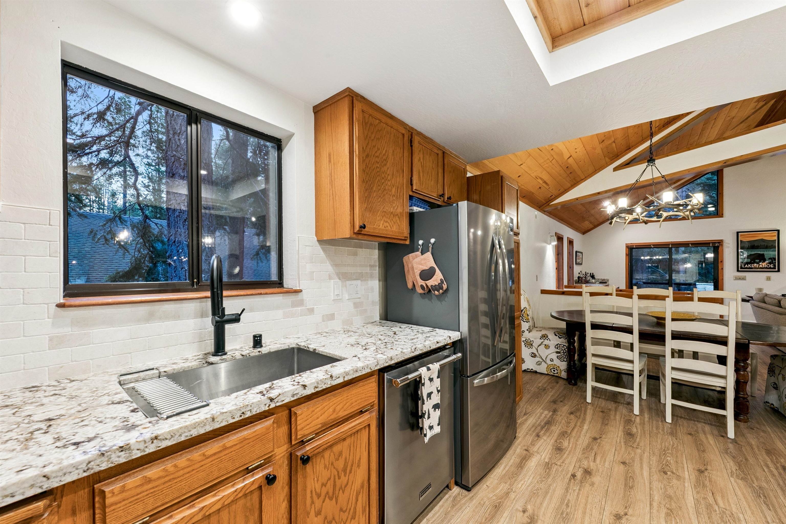 12095 Oslo Drive Truckee, CA 96161 - Photo 10 of 28 a kitchen with a sink and wooden cabinets