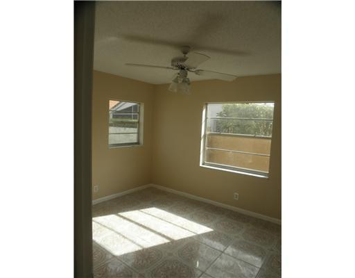 22747 Southwest 55th Way Boca Raton, FL 33433 - Photo 9 of 15 a view of an empty room with a window