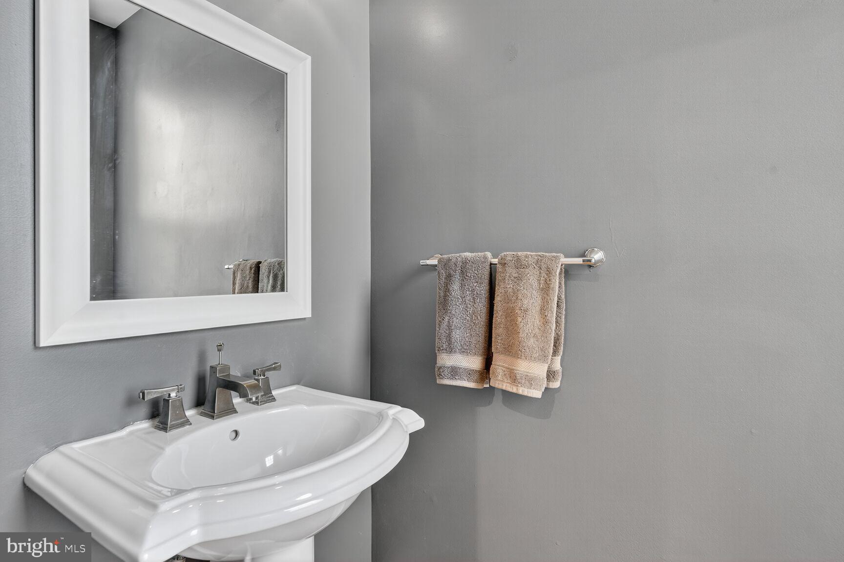 1730 1st Street Northwest, Unit 2 Washington, DC 20001 - Photo 11 of 27 a bathroom with a sink and a mirror