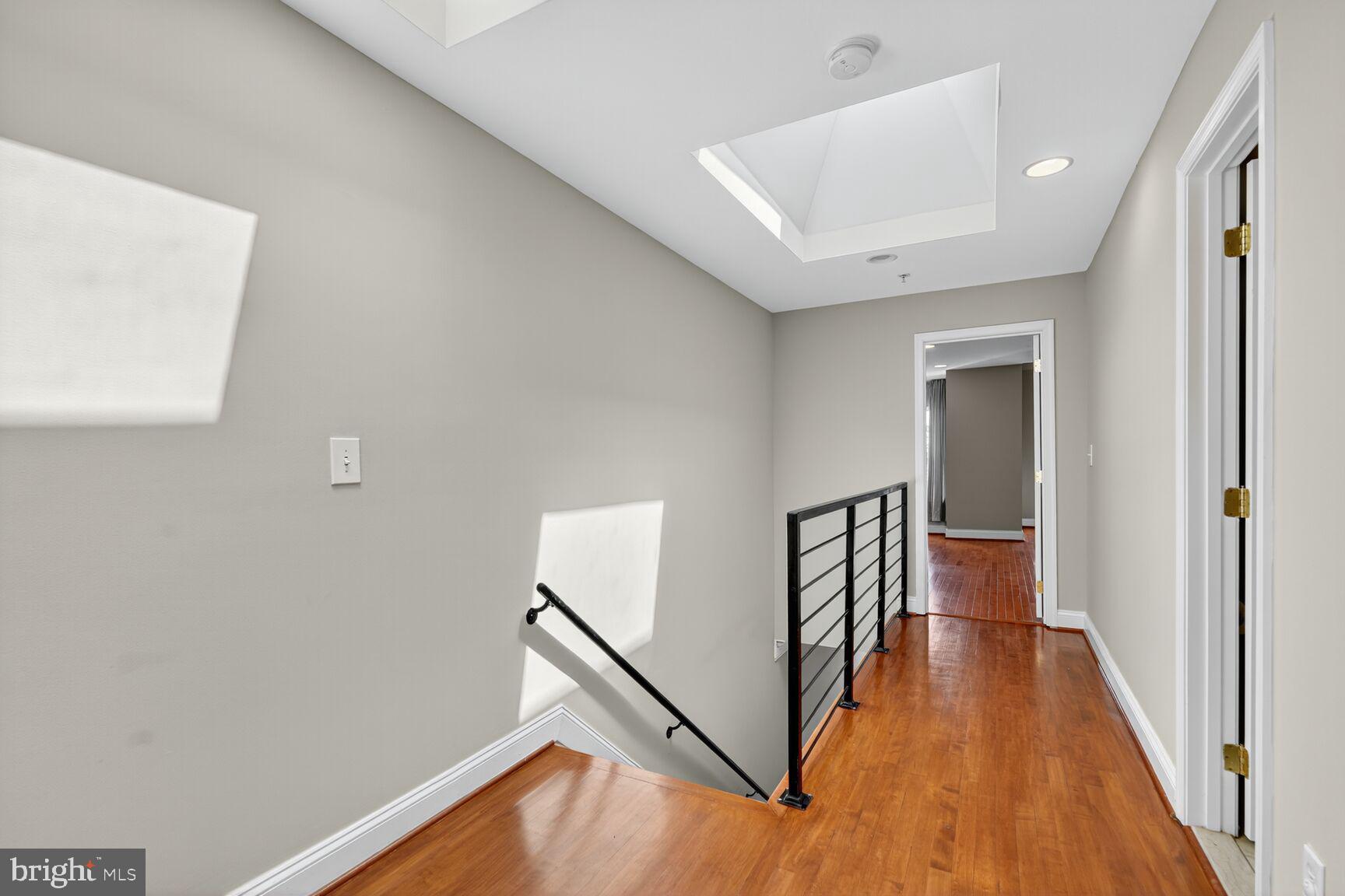 1730 1st Street Northwest, Unit 2 Washington, DC 20001 - Photo 12 of 27 a view of hallway with wooden floor