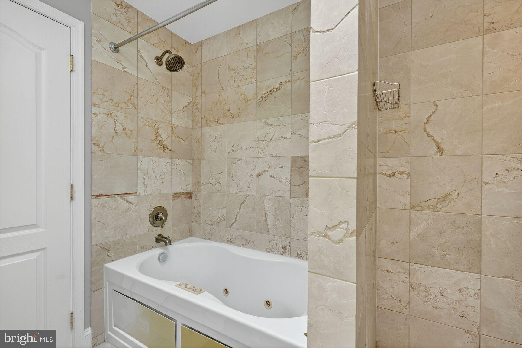 1730 1st Street Northwest, Unit 2 Washington, DC 20001 - Photo 15 of 27 a bathroom with a bathtub and shower