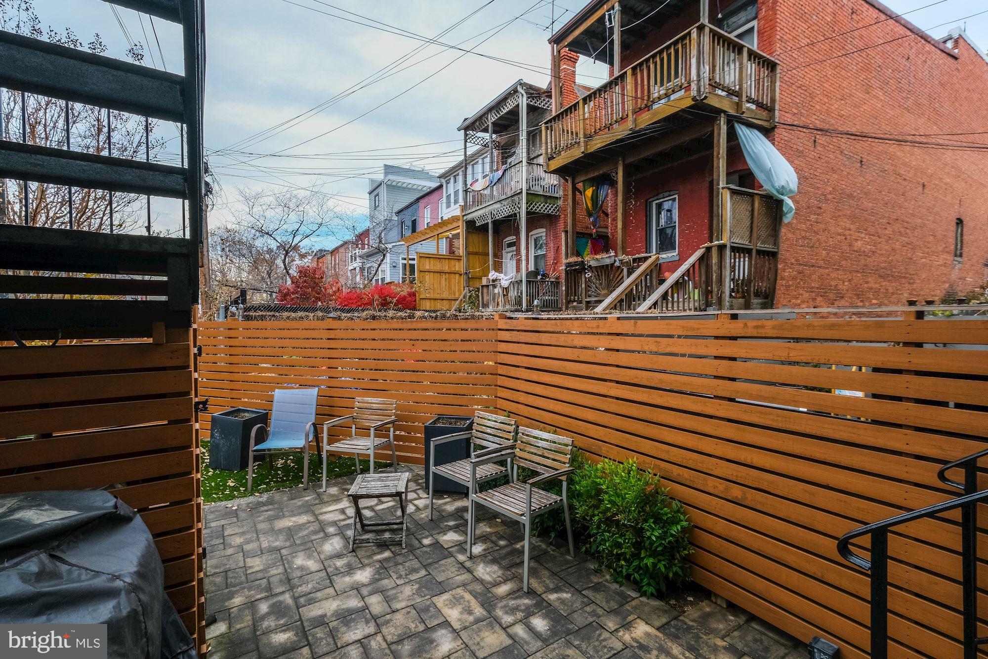 1730 1st Street Northwest, Unit 2 Washington, DC 20001 - Photo 20 of 27 a view of a chairs and table on the terrace