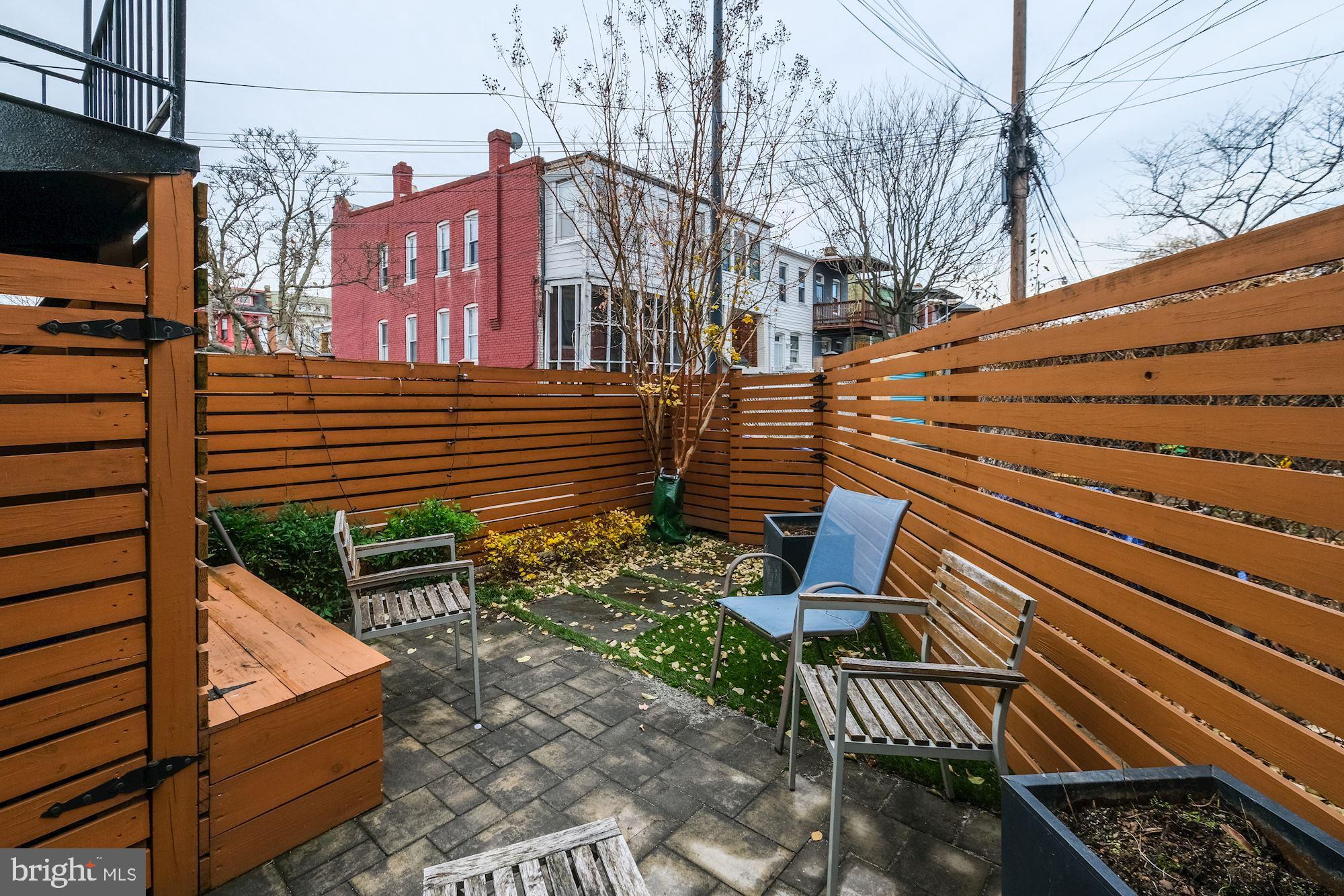 1730 1st Street Northwest, Unit 2 Washington, DC 20001 - Photo 21 of 27 a view of a chairs setting on the deck