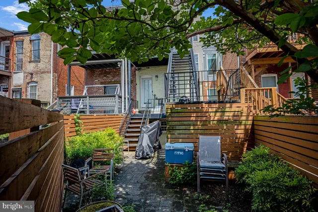 a car parked in front of a house