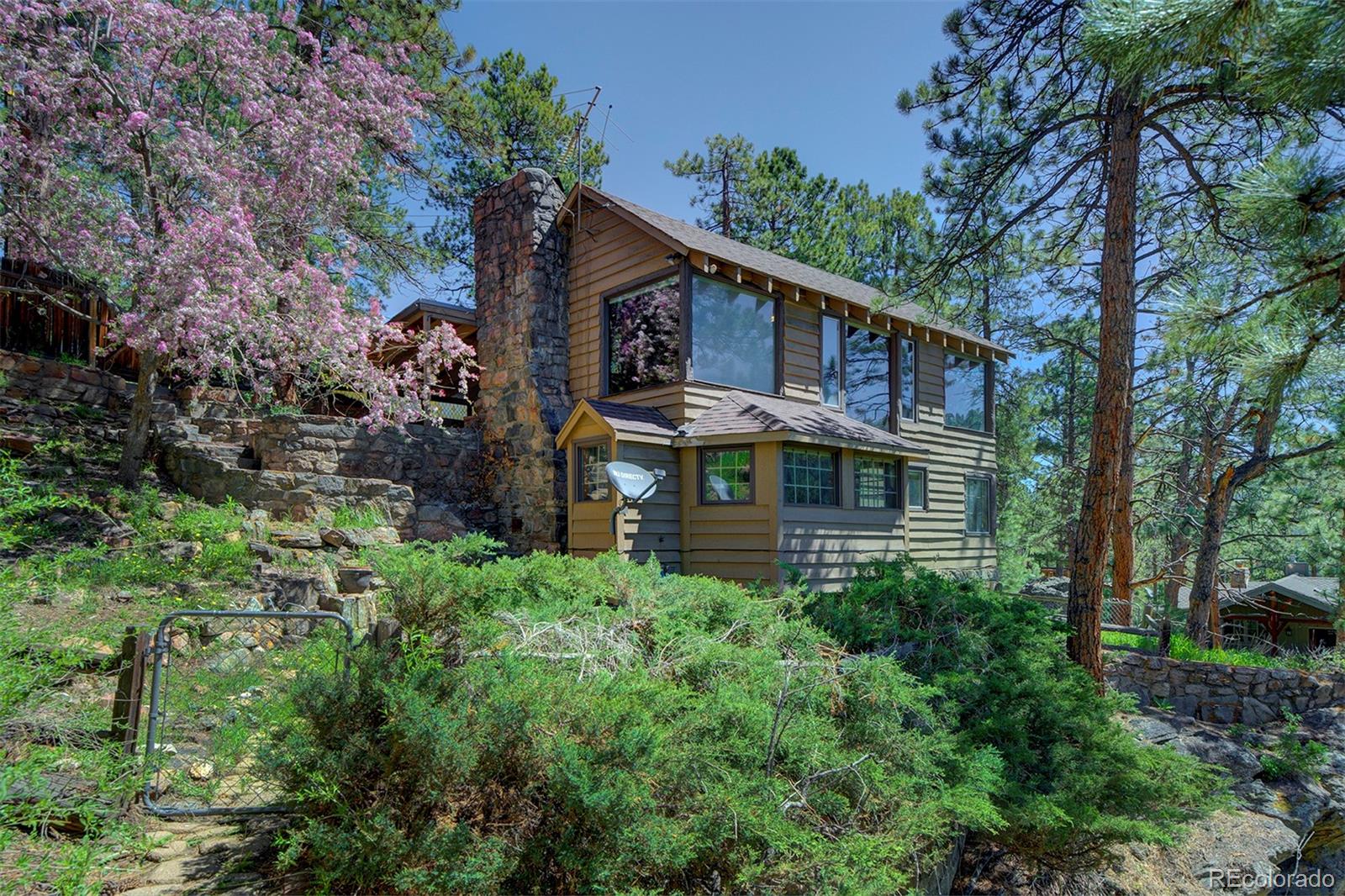 28424 Kinnikinnick Road Evergreen, CO 80439 - Photo 1 of 40 Gallery Image 1