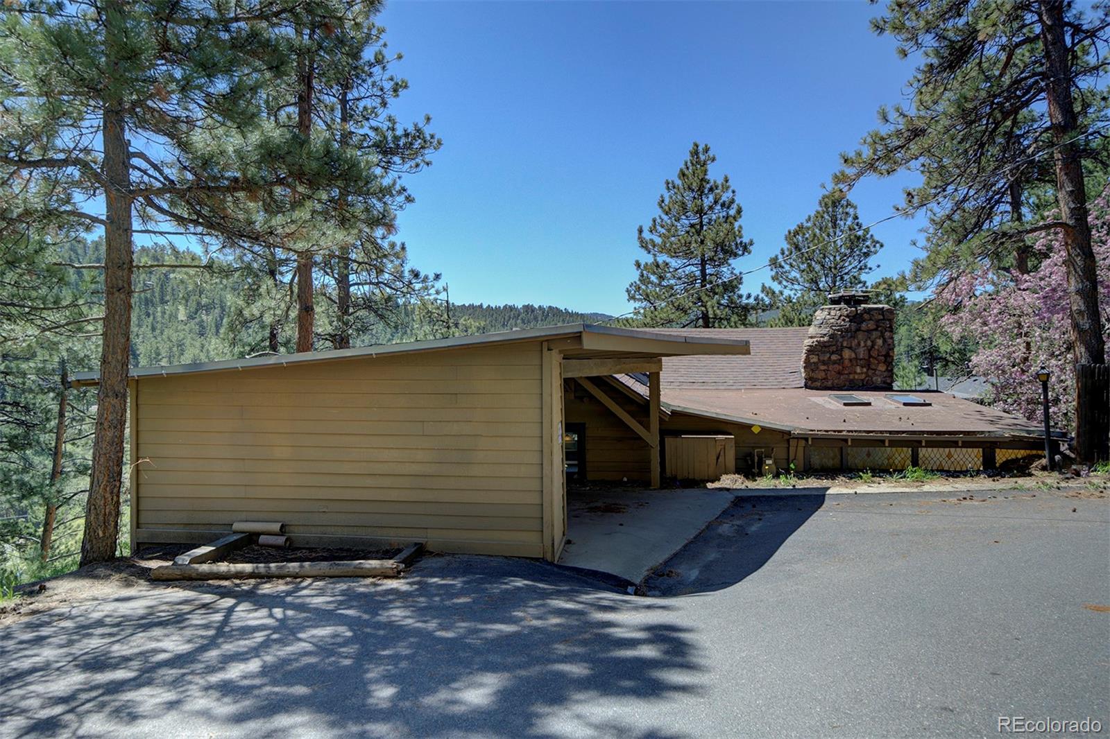 28424 Kinnikinnick Road Evergreen, CO 80439 - Photo 36 of 40 Gallery Image 36