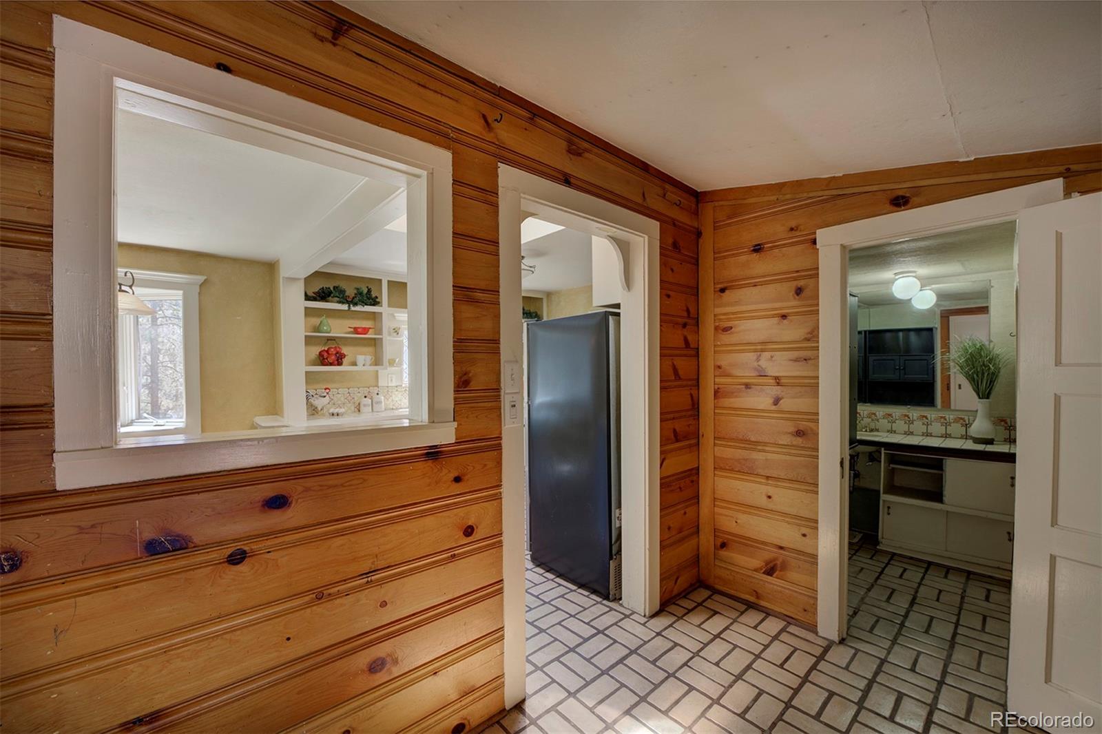 28424 Kinnikinnick Road Evergreen, CO 80439 - Photo 6 of 40 Gallery Image 6