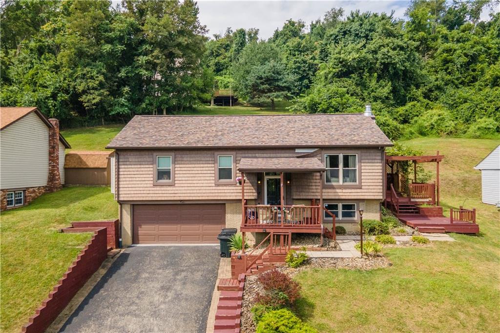 227 Davidson Drive Charleroi, PA 15022 - Photo 1 of 40 a aerial view of a house with swimming pool table and chairs