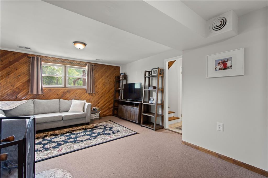 227 Davidson Drive Charleroi, PA 15022 - Photo 22 of 40 a living room with furniture and a window