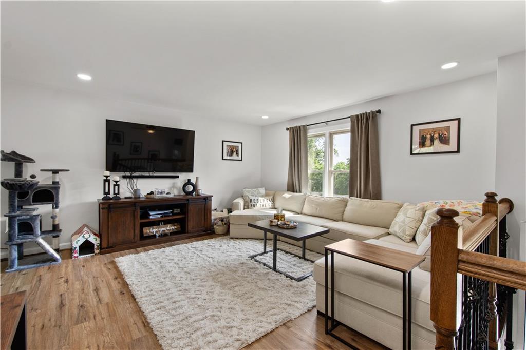 227 Davidson Drive Charleroi, PA 15022 - Photo 3 of 40 a living room with furniture and a flat screen tv