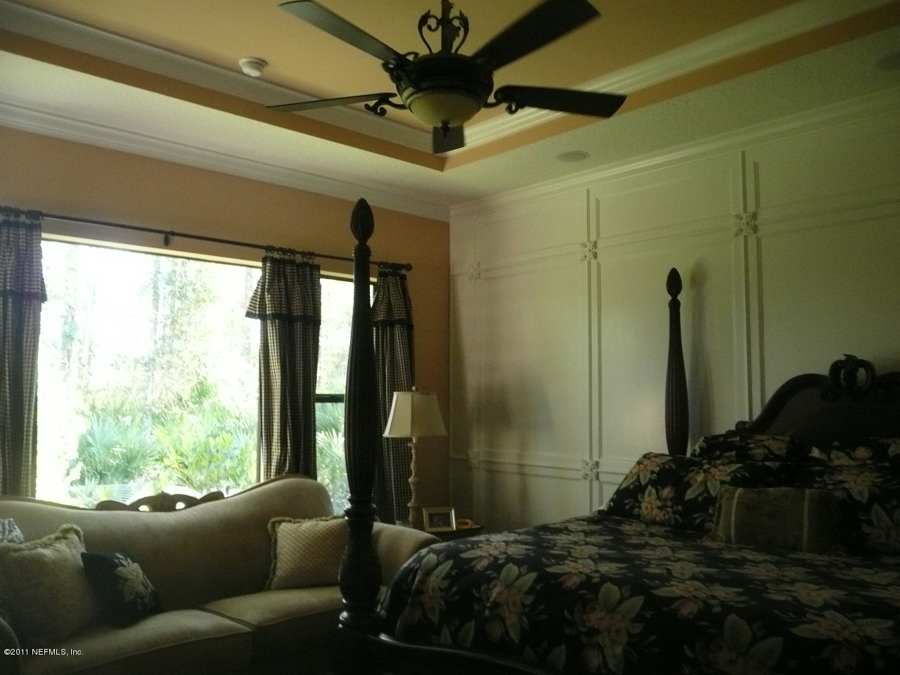 308 Mission Trace Drive St. Augustine, FL 32084 - Photo 12 of 20 a bedroom with a bed window and a ceiling fan