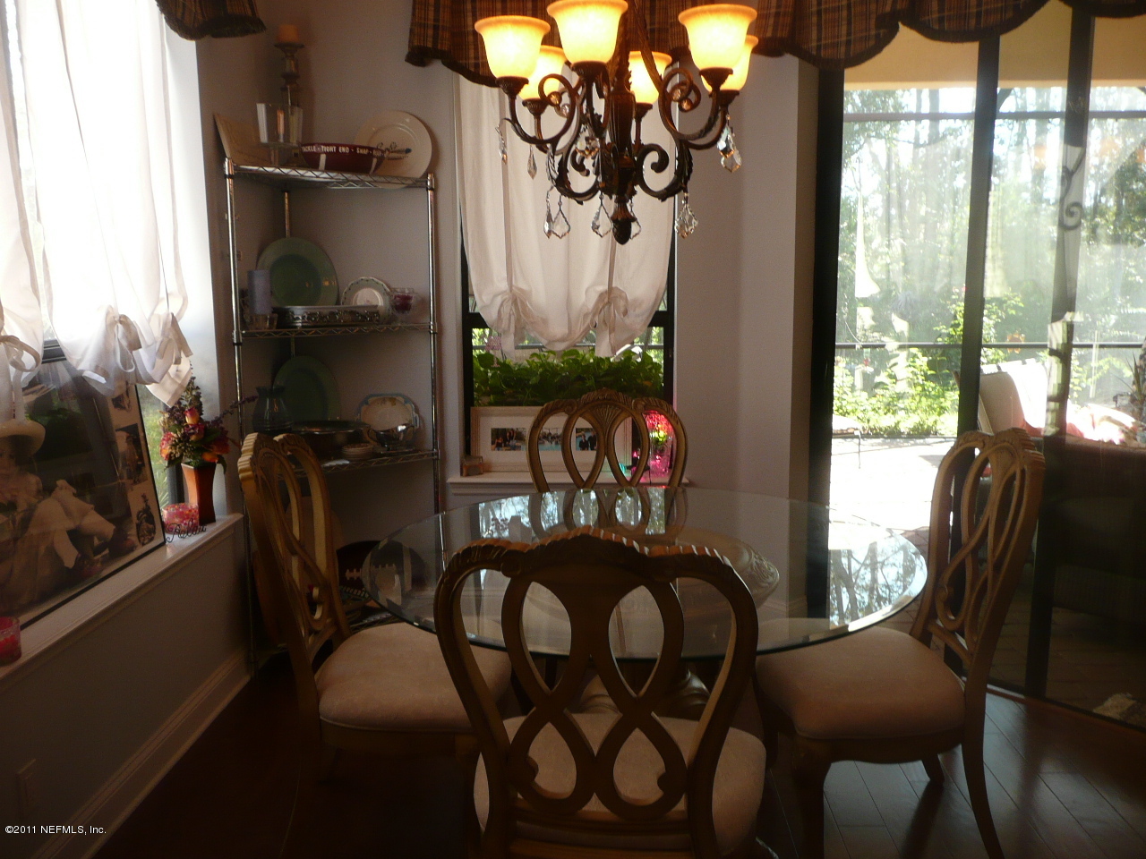 308 Mission Trace Drive St. Augustine, FL 32084 - Photo 13 of 20 a view of a dining room with furniture window and outside view