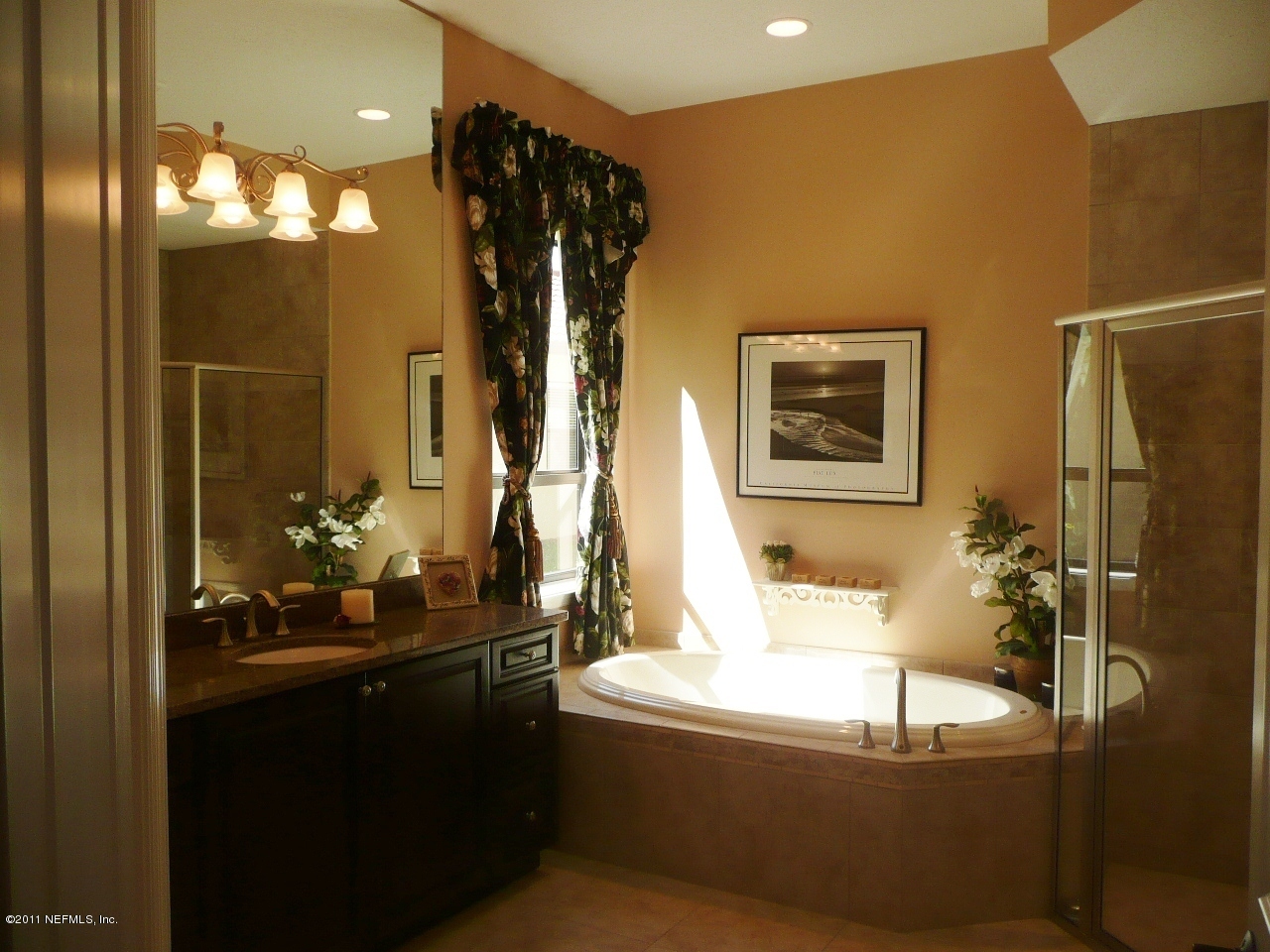 308 Mission Trace Drive St. Augustine, FL 32084 - Photo 14 of 20 a bathroom with a bathtub and a sink