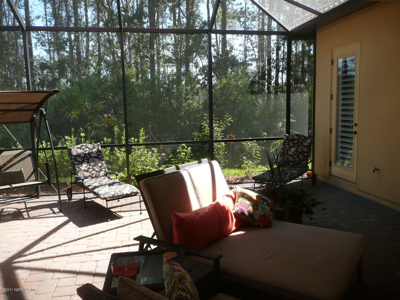 308 Mission Trace Drive St. Augustine, FL 32084 - Photo 4 of 20 a view of a couches in a patio