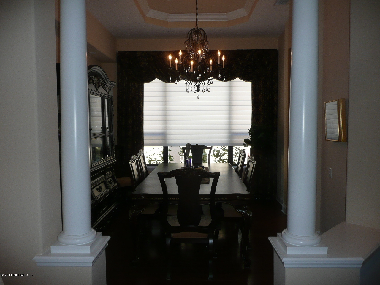 308 Mission Trace Drive St. Augustine, FL 32084 - Photo 5 of 20 a view of a dining room with furniture and chandelier