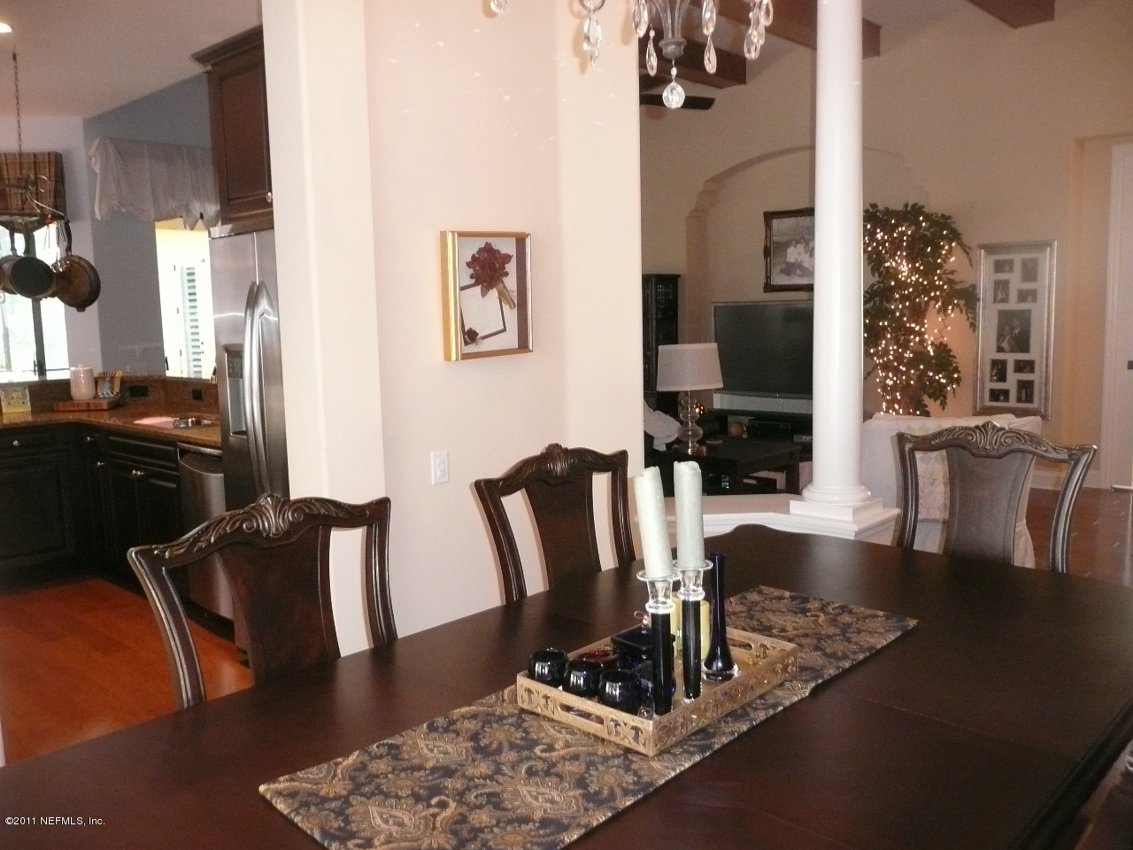 308 Mission Trace Drive St. Augustine, FL 32084 - Photo 10 of 20 a dining room with furniture and wooden floor