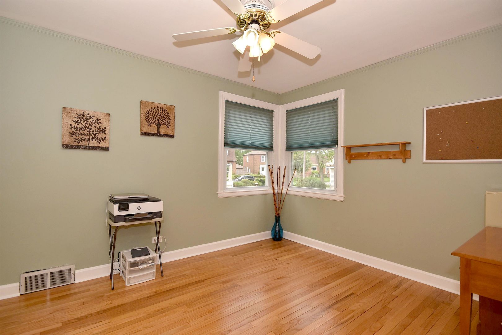 8423 Riverside Avenue Brookfield, IL 60513 - Photo 16 of 28 a view of a workspace with furniture and a window