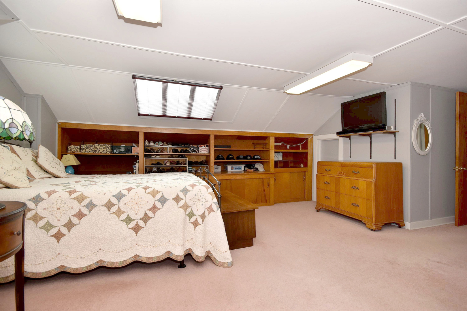 8423 Riverside Avenue Brookfield, IL 60513 - Photo 20 of 28 a bedroom with bed and flat screen tv